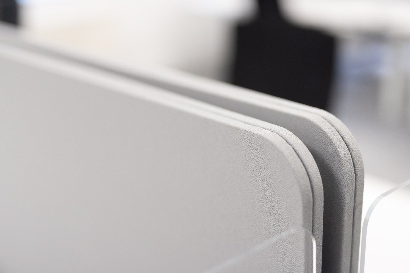 Upholstered acoustic desk screen edge detail